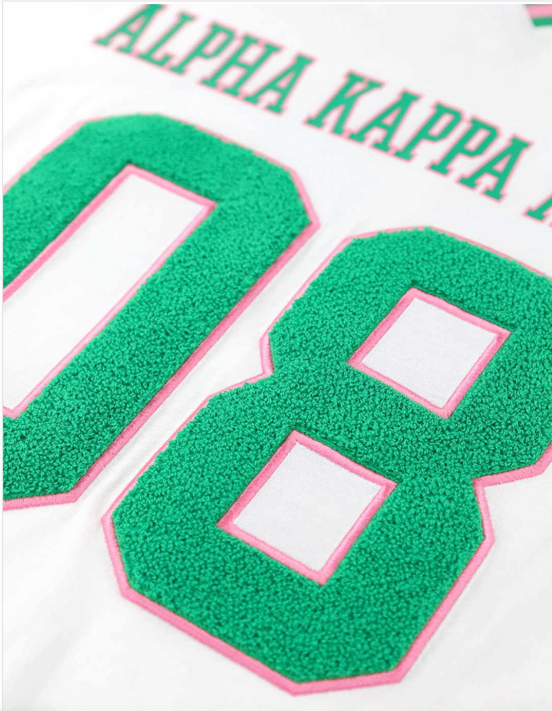 AKA OVERSIZED CHENILLE FOOTBALL JERSEY TEE